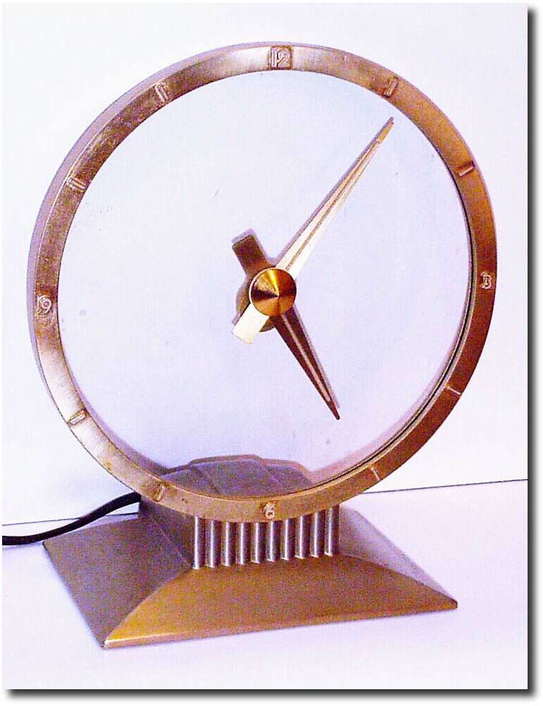 C.1955, Jefferson Electric Co, Bellwood, IL, "Golden Hour' mystery clock (110 volt). — Antique Clocks Price Guide
