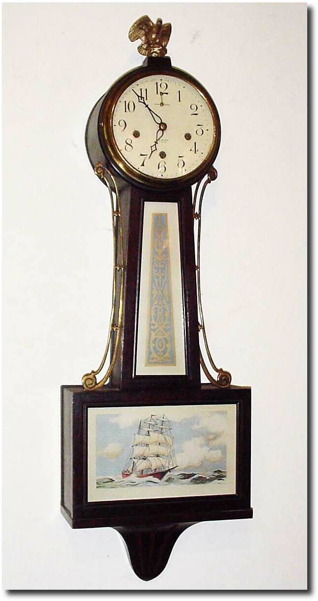 New Haven Clock Co., "Whitney' Westminster chime banjo clock in good condition. — Antique Clocks Price Guide