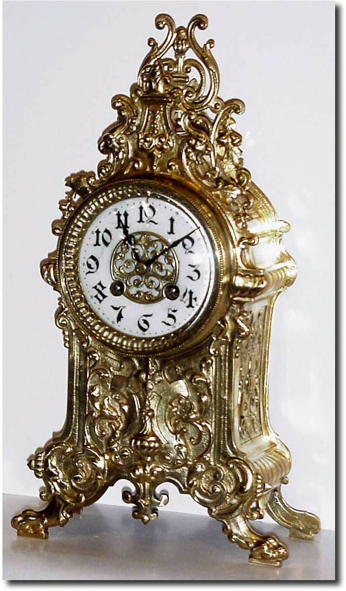 C.1890, French, Brass Architectural clock, the front with a fountain motif. — Antique Clocks Price Guide