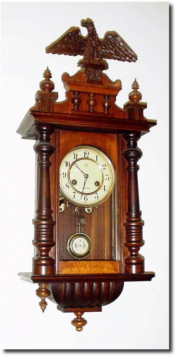 C.1900, Swedish, by Junghans factory in Sweden, small 8-day "R-A' regulator, striking on a coiled wire gong. — Antique Clocks Price Guide