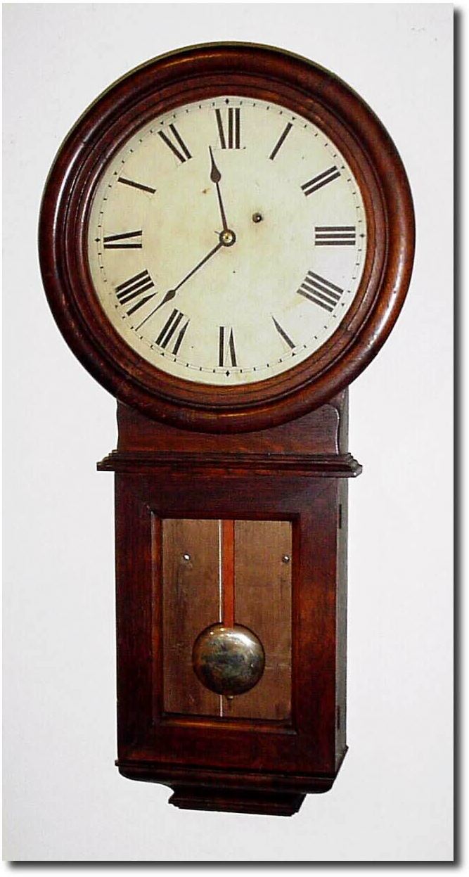 C.1925, Waltham Clock Co., Waltham, Mass, Regulator No. 34, late version with S curve bottom, in oak, serial no. 3595. — Antique Clocks Price Guide