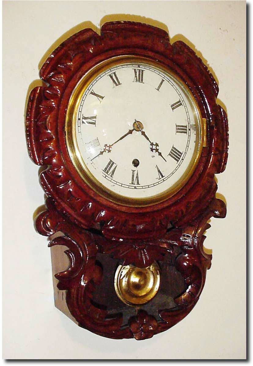 Mixed lot: A C.1850, Mini English carved drop dial case that undoubtedly had a fusee movement, NOW with an American, Jerome 8-day time only open spring movement. — Antique Clocks Price Guide