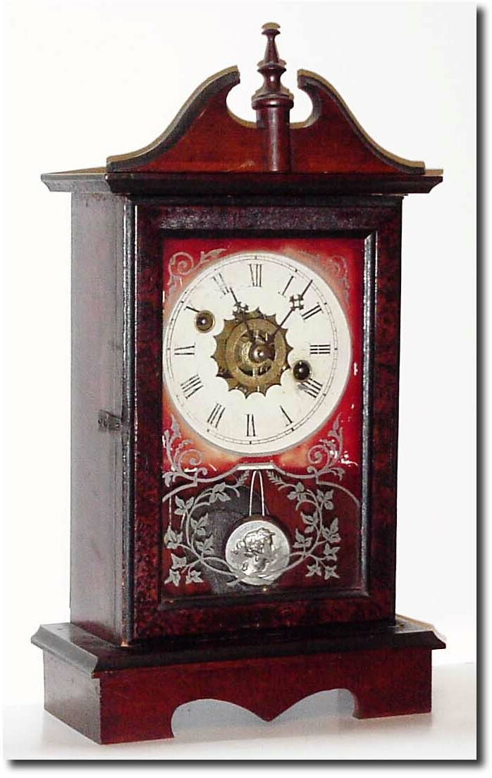 C.1890, Wm L. Gilbert "Chromo Time' in very good original condition with original top, finish, dial, label, tablet, and "Trojan' pendulum. — Antique Clocks Price Guide