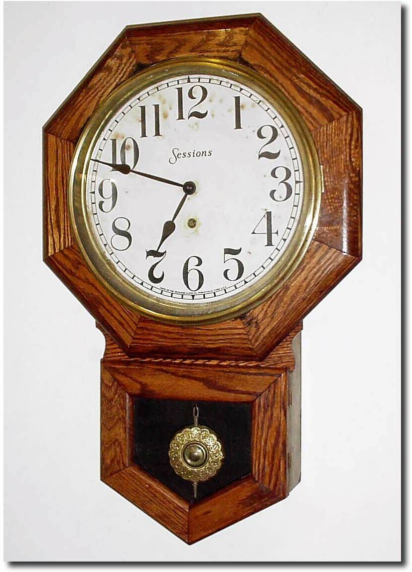 C.1910, Sessions Short Drop in solid oak, in generally clean condition. — Antique Clocks Price Guide