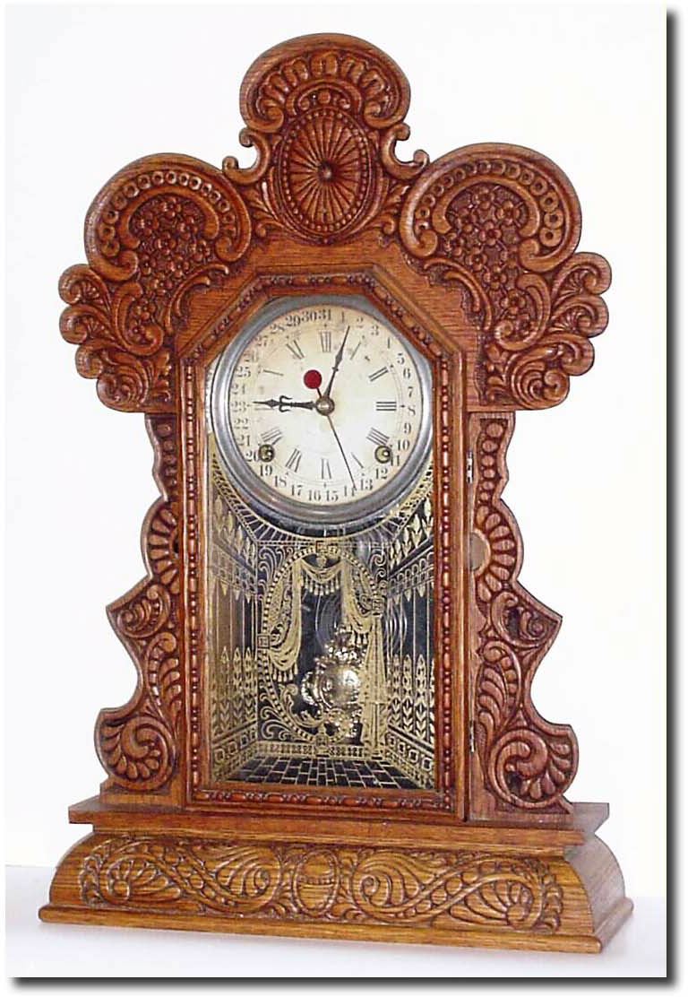 C.1910, E. Ingraham and Co., "GILA', Calendar Gingerbread in excellent condition. — Antique Clocks Price Guide