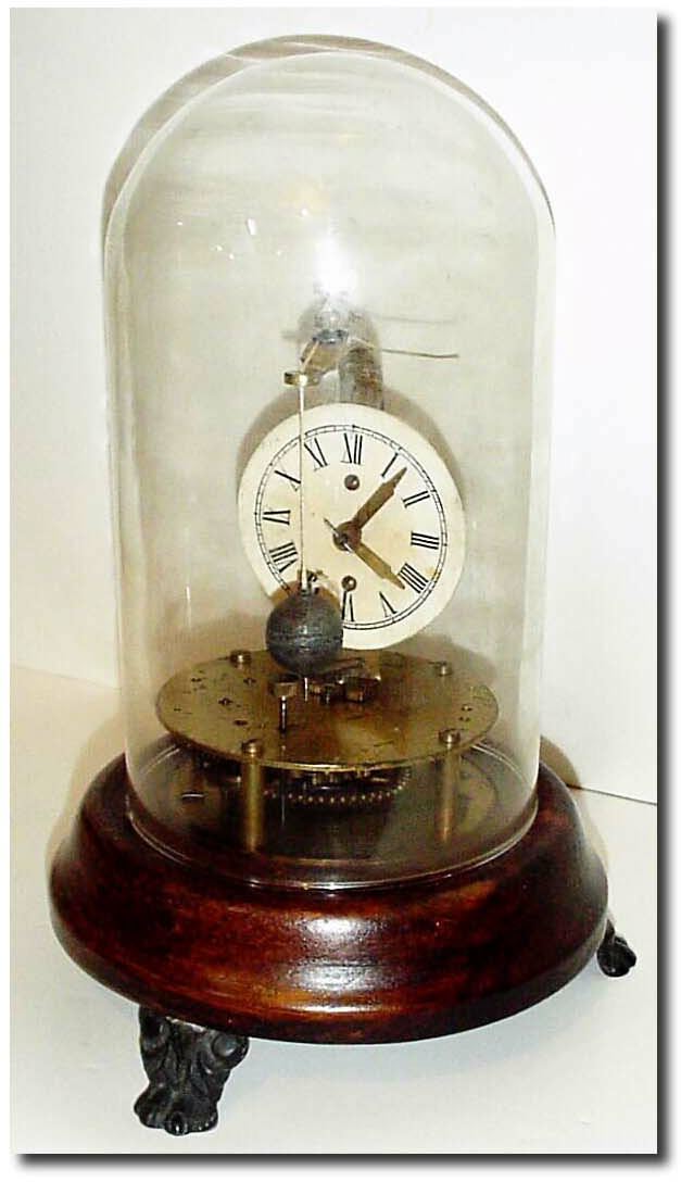 C.1875, E.N. Welch, version of Briggs patent rotary pendulum clock with restorations. — Antique Clocks Price Guide