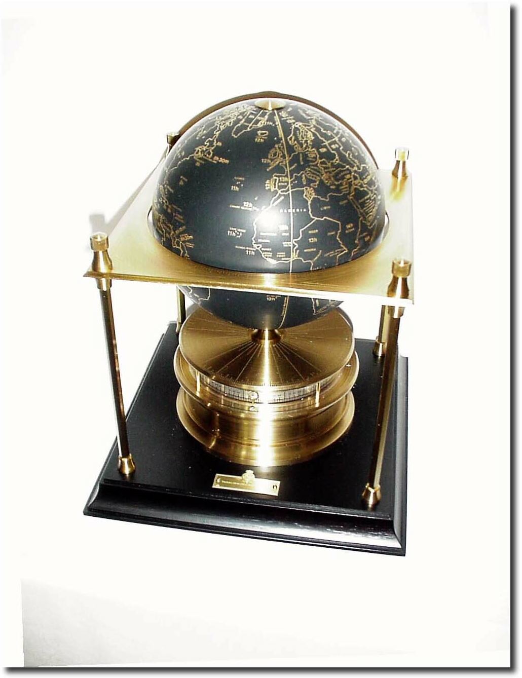 C.1979 (dated brochure), as new, "World Clock', as designed by the Royal Geographic Society, and distributed in the US by Franklin Mint — Antique Clocks Price Guide