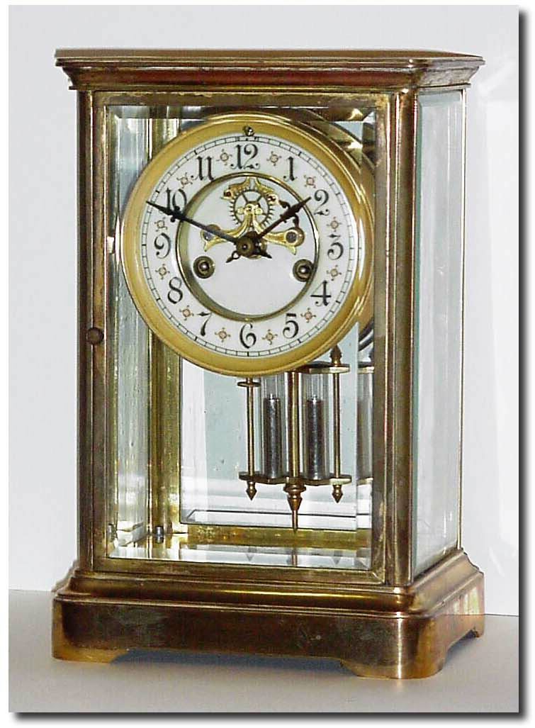 C.1912, Waterbury, "TOULON', Brass and Glass, crystal regulator in excellent original condition. — Antique Clocks Price Guide