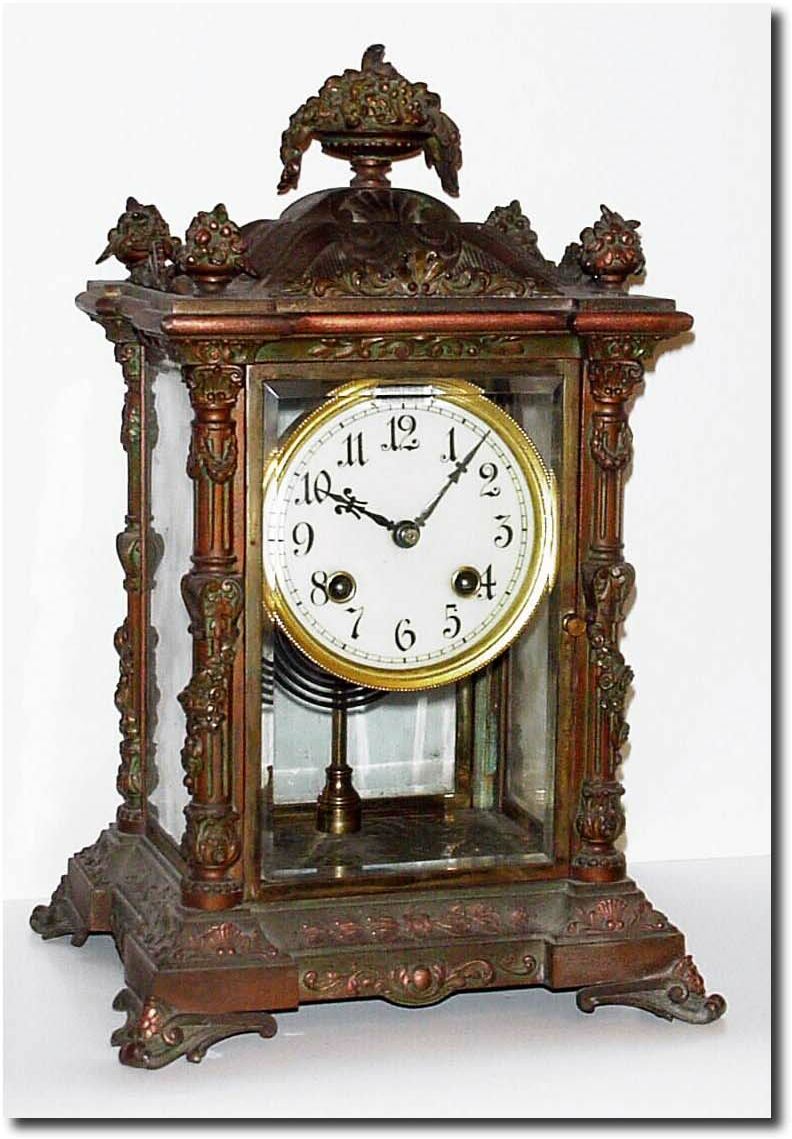 C.1905, Ansonia "NORMA', bronzed spelter crystal regulator in good, but dirty condition. — Antique Clocks Price Guide
