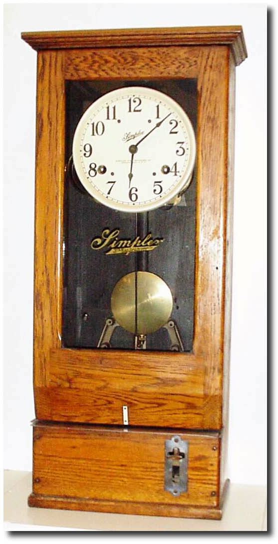 C.1920, Simplex Time Recorder Co., Gardner, Mass, a good small oak time punch clock in immaculate condition. — Antique Clocks Price Guide