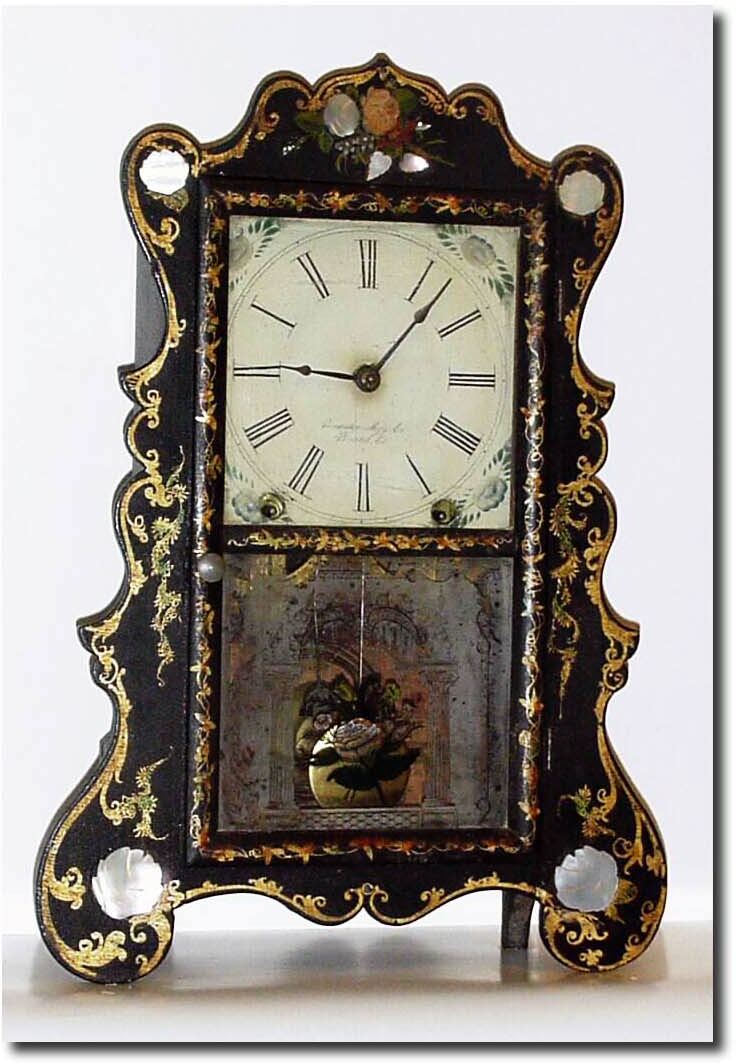 C.1852, Brewster Mfg. Co., Bristol, Conn, an excellent example of a gold leafed case with MOP accents. — Antique Clocks Price Guide