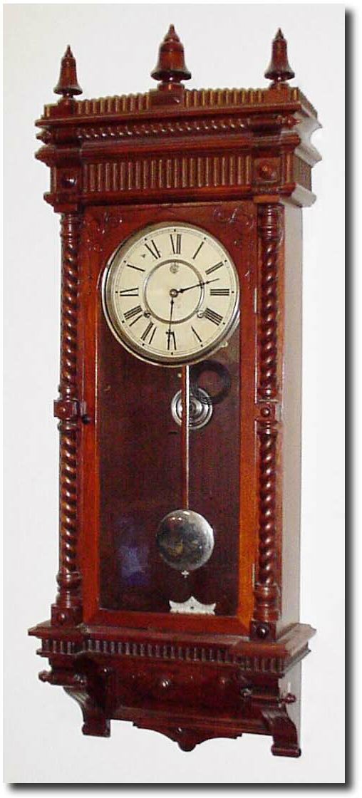 C.1890, Waterbury "Perth', walnut wall clock in excellent condition. — Antique Clocks Price Guide