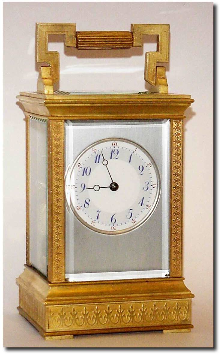 C.1900, French, Brass Cased Carriage Clock time and strike, in an unusual case with fancy embossing on all flat surfaces (burnished trefoils on a grooved background). — Antique Clocks Price Guide