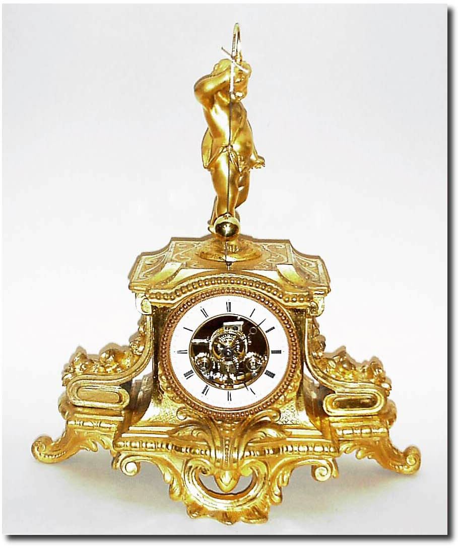 C.1890, French, Gilded Spelter Conical clock, rotary pendulum. — Antique Clocks Price Guide