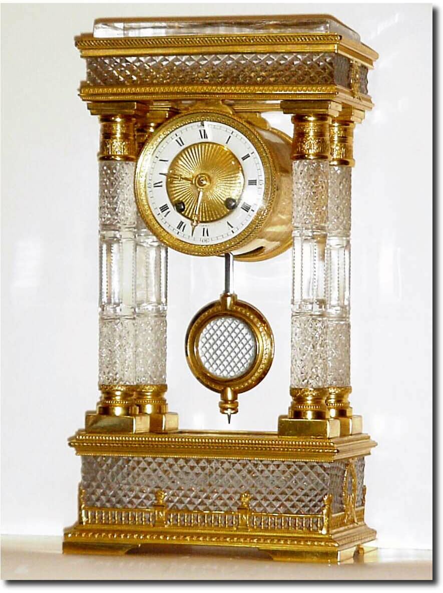 C.1890, French for J.E. Caldwell, Philadelphia, a 4 column Empire clock of Baccarat crystal. — Antique Clocks Price Guide