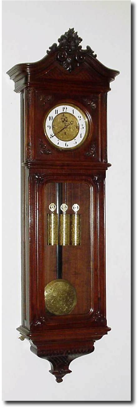 C.1890, Austrian, 3-Weight, Grand Sonnerie, in an extra long walnut baroque case (72 beat). — Antique Clocks Price Guide