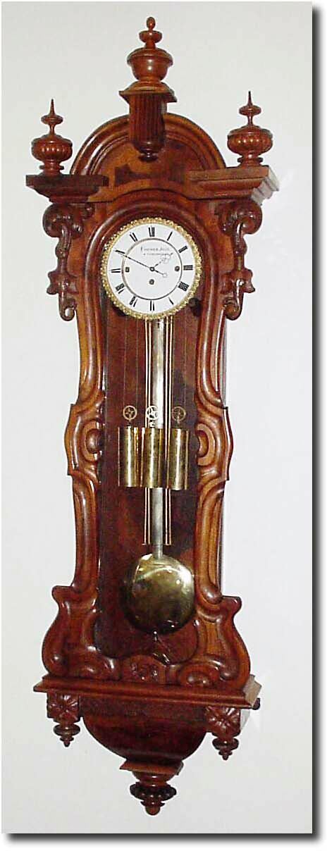 C.1865, Austrian, 3-Weight Grand Sonnerie, in a long serpentine case with 72 beat movement. — Antique Clocks Price Guide