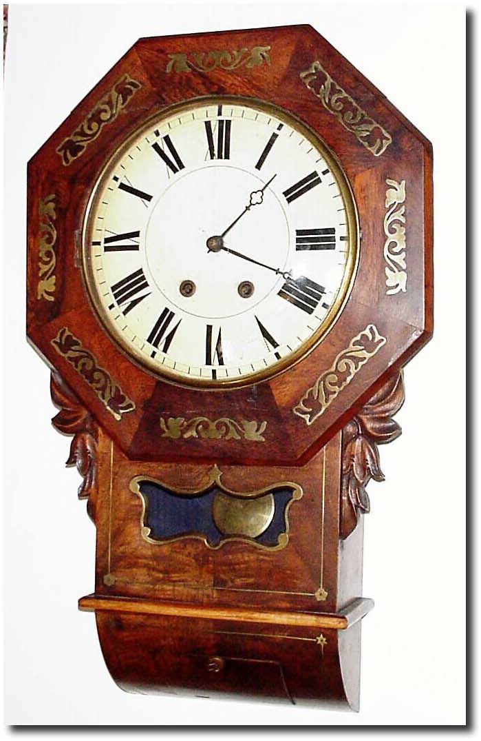 C.1890, German, Drop dial clock with wooden plated movement and convex wooden dial. — Antique Clocks Price Guide