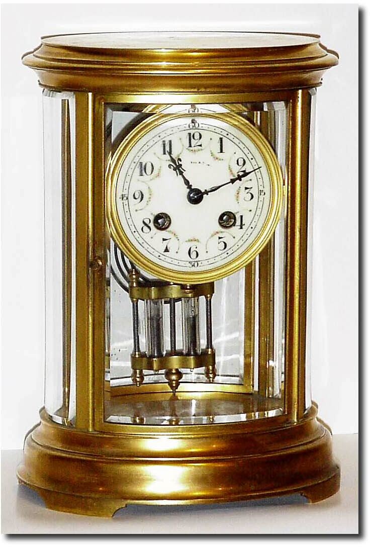 C.1900, French Oval Crystal Regulator in excellent original condition with gilding intact. — Antique Clocks Price Guide