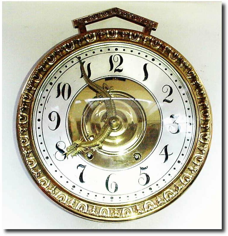 C.1900, Tiffany and Co., Makers, NY, a very unusual cast and hand finished ship"s bell clock in a large round case with handle. — Antique Clocks Price Guide