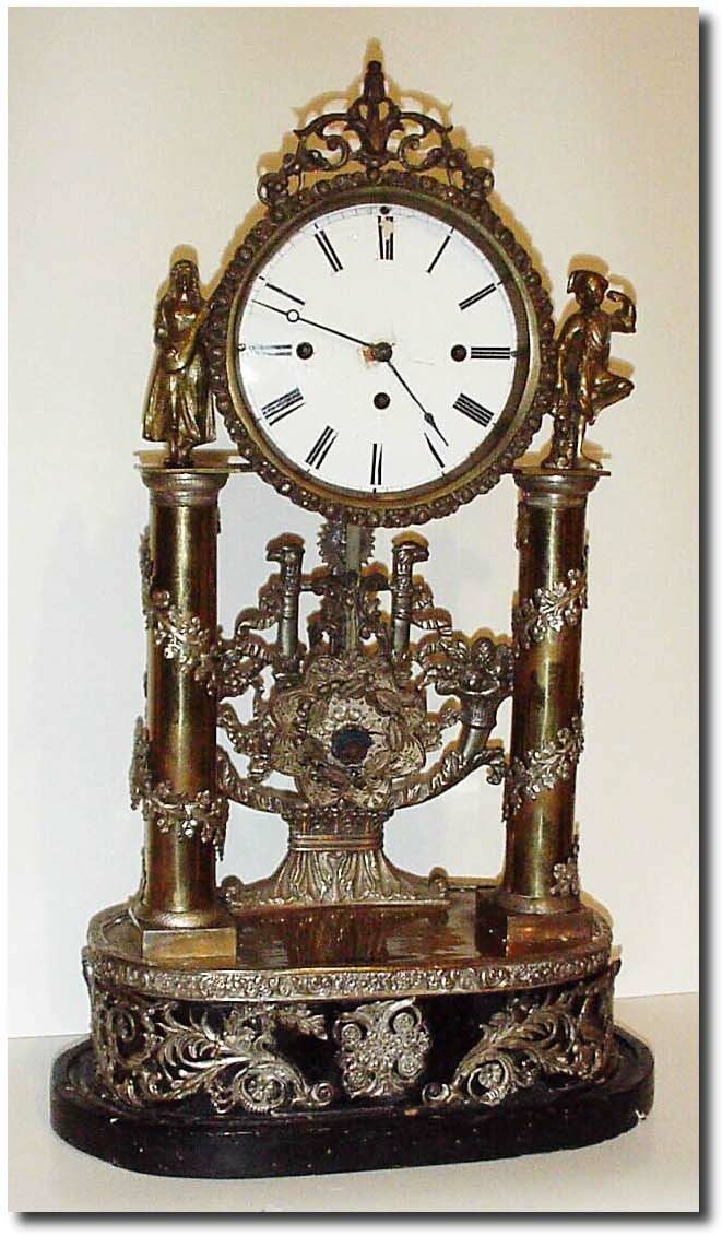 C.1820, Austrian, Grand Sonnerie Mantel clock in a skeletonized motif. — Antique Clocks Price Guide