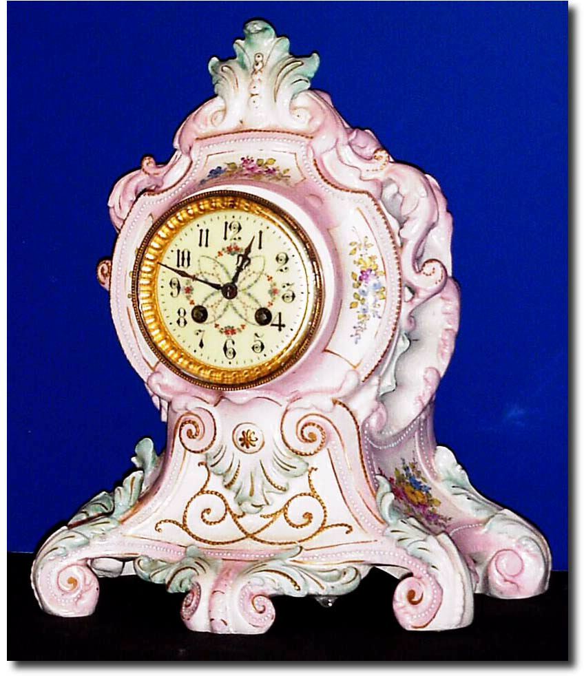 C.1900, French, Porcelain China clock with fancy floral dial. — Antique Clocks Price Guide