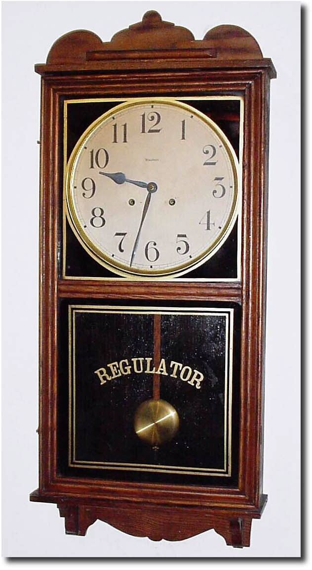 C.1915, Waterbury "Pelican' Time and Strike store regulator, oak, in excellent original condition. — Antique Clocks Price Guide