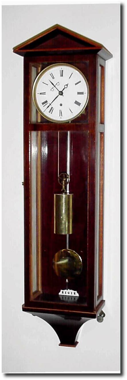 C.1998, Hungarian replica of a Viennese mini Dachluhr, 1-weight, time with a porcelain dial and well made movement with silk thread suspension and steel pendulum with brass bob. — Antique Clocks Price Guide
