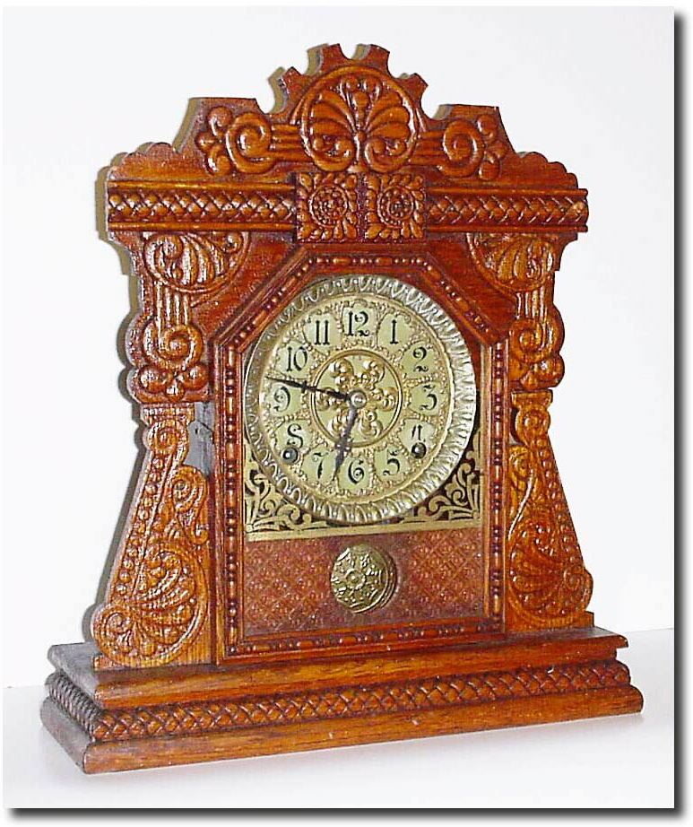 C.1900, E. Ingraham and Co., "Cabinet C' in oak and in excellent original condition, with medium brown color and crazing. — Antique Clocks Price Guide