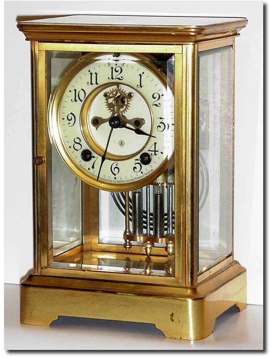 C.1910, Ansonia Crystal Regulator with open escapement on the dial, and in very good original condition, with much original gilding intact. — Antique Clocks Price Guide