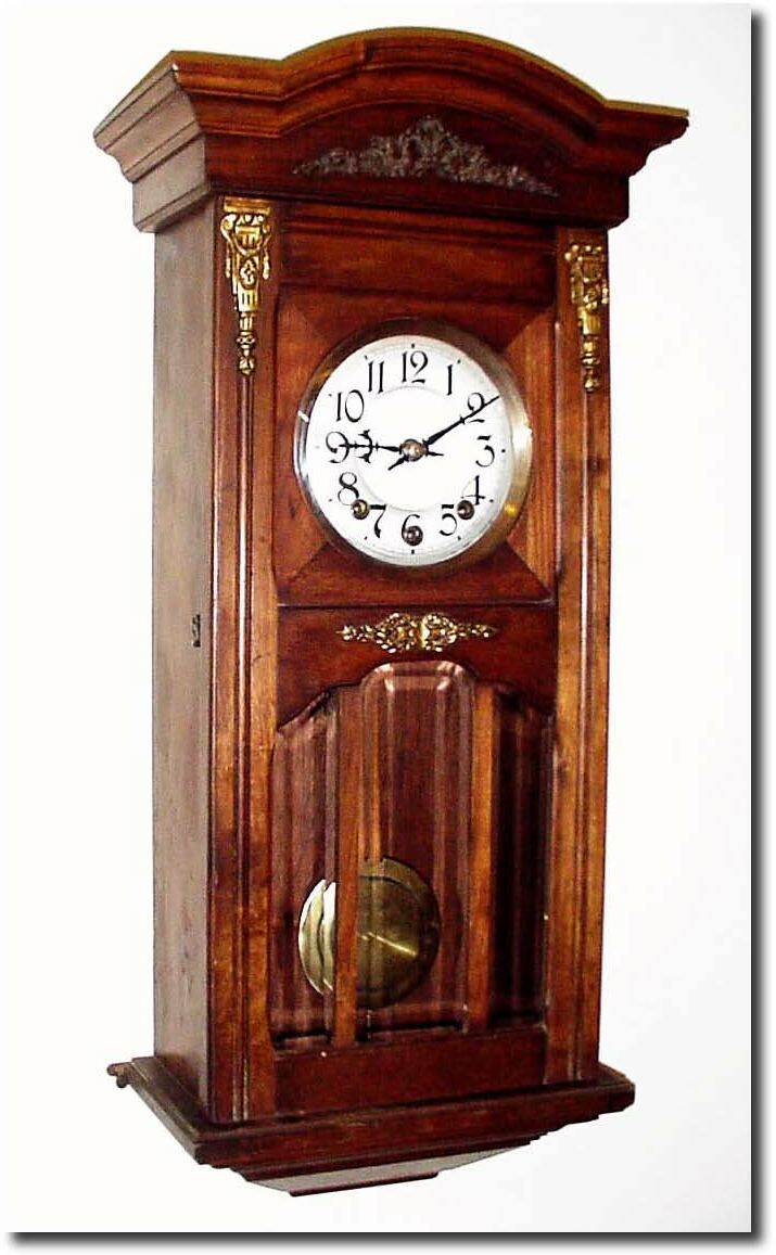 C.1900, French, Morbier, Westminster chime wall clock, in a fancy walnut case with beveled glass and ormolu trim. — Antique Clocks Price Guide