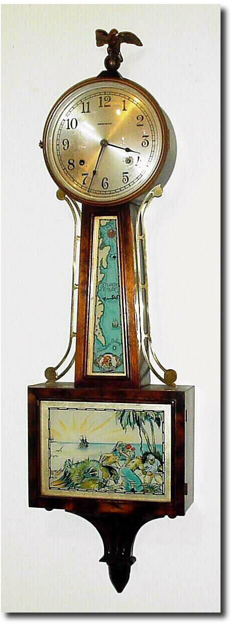 C.1935, E. Ingraham Co, "Treasure Island' banjo in very good original condition, with original finish, dial, tablets, eagle and pend. — Antique Clocks Price Guide