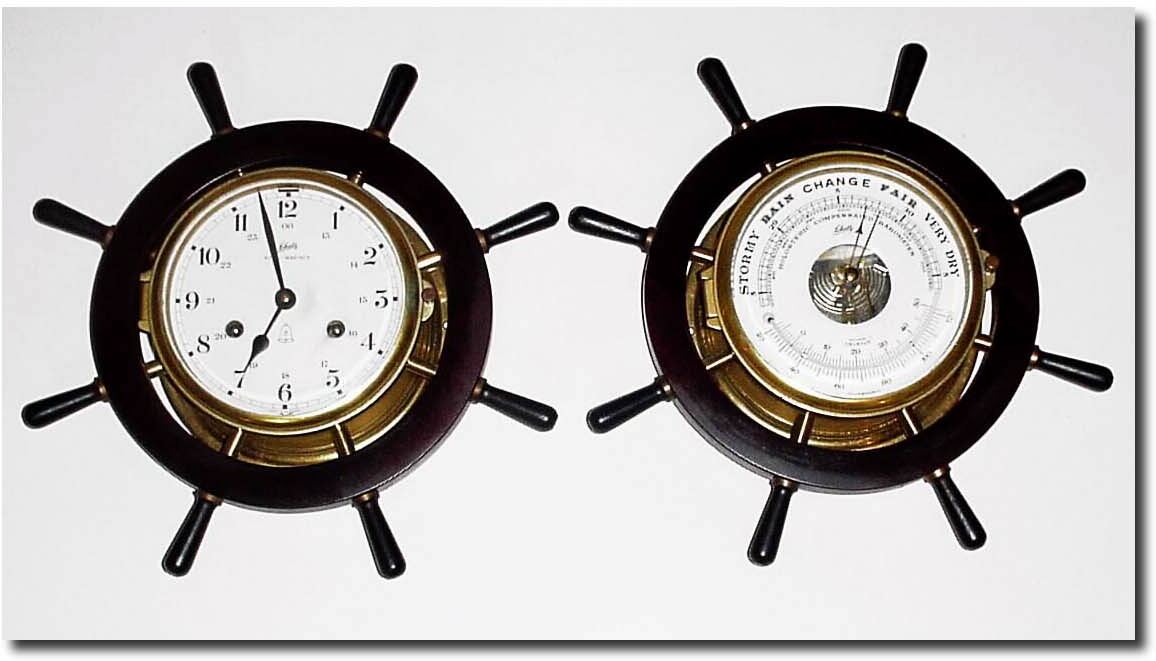 C.1955, German, Schatz, "Royal Mariner' Ship"s Bell clock in ship"s wheel motif, with matching aneroid barometer, and in working order. — Antique Clocks Price Guide