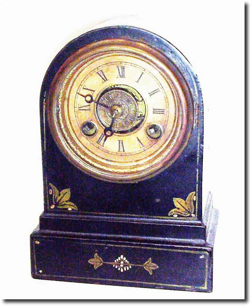 C.1868, Terry Clock Co., Waterbury, Con, smallest round gothic cast iron time and alarm shelf clock in excellent original condition. — Antique Clocks Price Guide