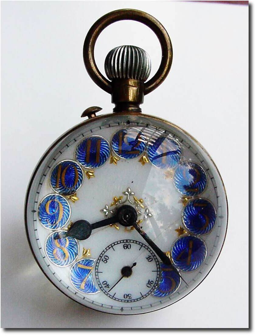 C.1900, French, Paperweight Clock, with white enamel dial with gold numerals on blue shields. — Antique Clocks Price Guide