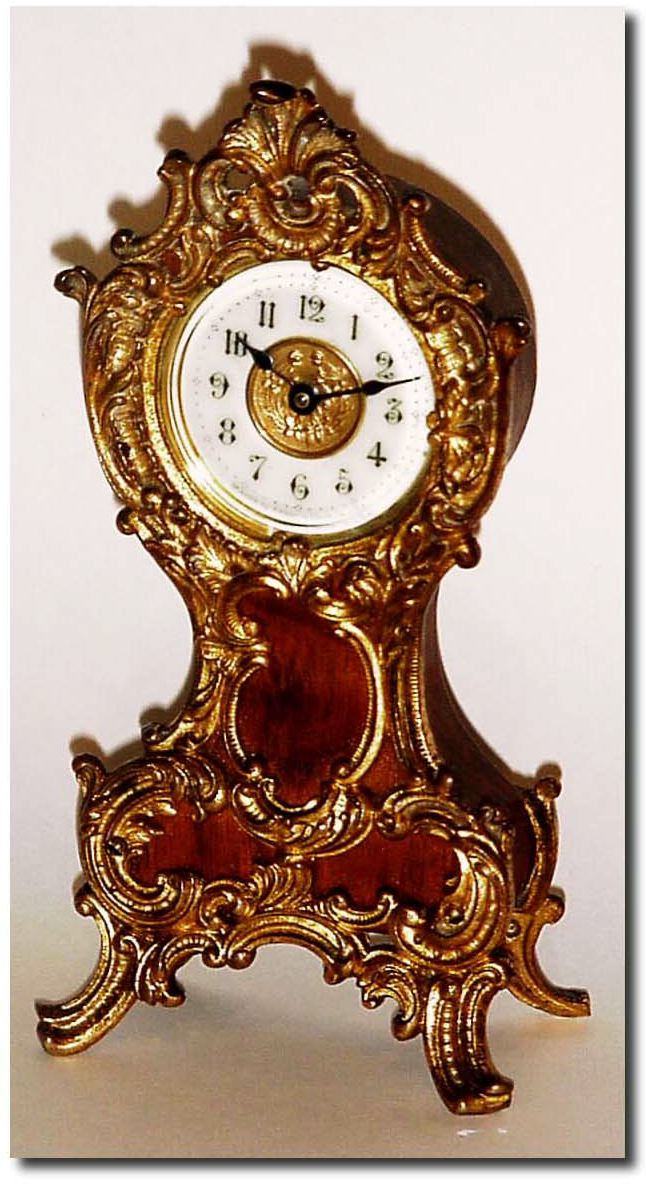 C.1904, Ansonia Clock Co., New York, "Cora' Mini Tall Case for the boudoir. — Antique Clocks Price Guide