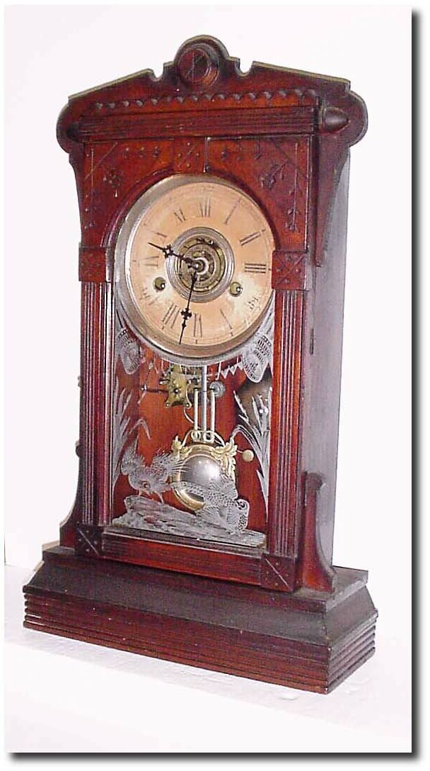 C.1885, Wm L. Gilbert, "Aldine' 30-Hour walnut mantel clock in fair to good original condition. — Antique Clocks Price Guide