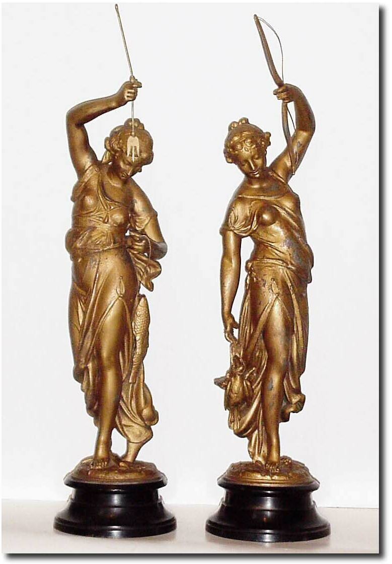 C.1904, Ansonia, "Huntress and Fisher" side garniture statues. — Antique Clocks Price Guide