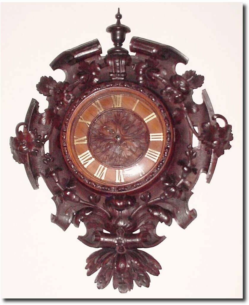 C.1850, French, Large Walnut Cartel clock with finely detailed carving of flowering vines. — Antique Clocks Price Guide
