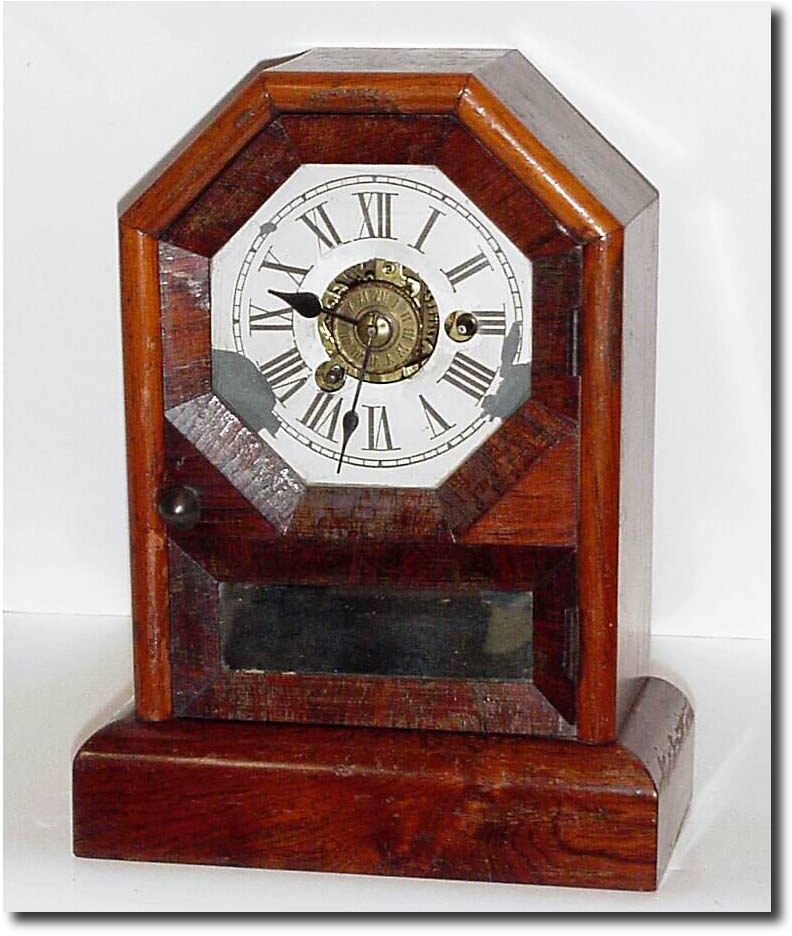 C.1868, Seth Thomas, Thomaston, Conn., "Octagon Top', time and alarm cottage clock in generally good condition. — Antique Clocks Price Guide