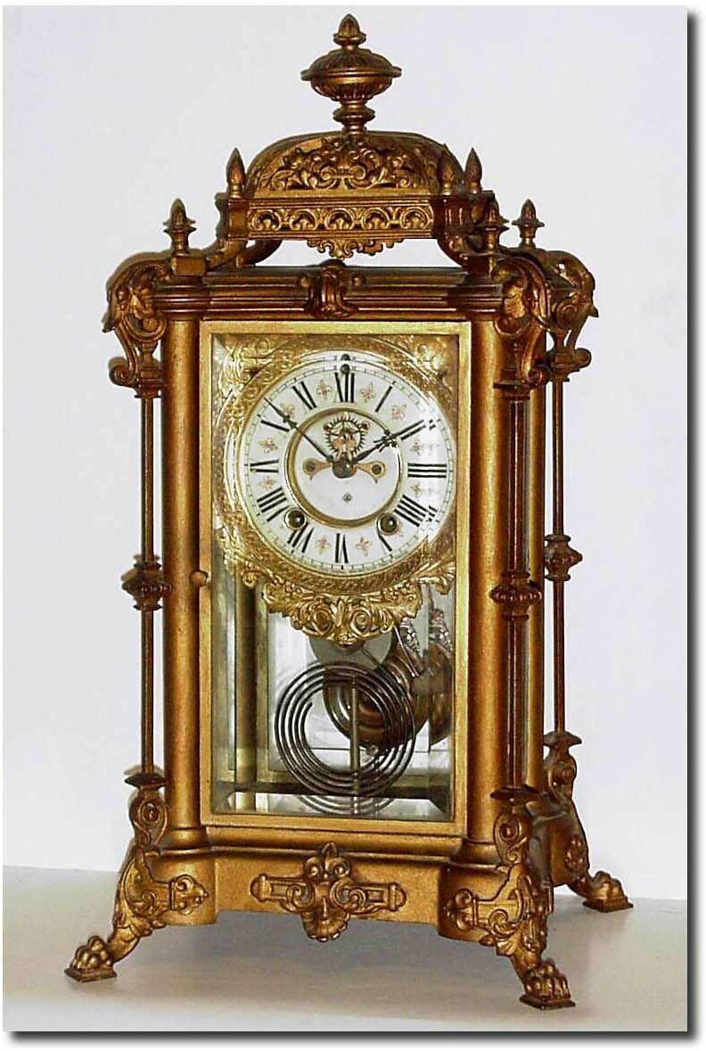 C.1904, Ansonia Clock Co., "Excelsior' brass and bronze crystal regulator, as-found. — Antique Clocks Price Guide