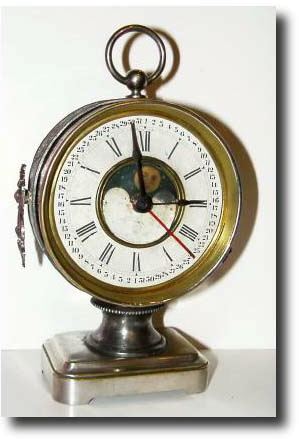 C.1880, Ansonia Clock Co, "Grandfather" traveling calendar clock with moonphase. — Antique Clocks Price Guide