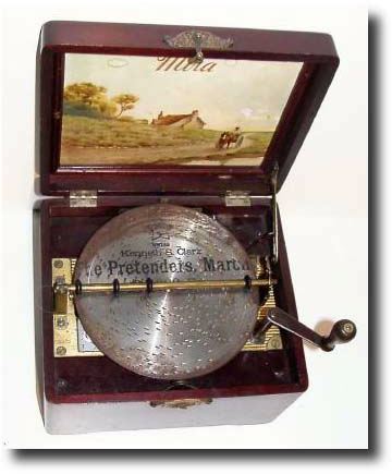 C.1905, German, Mira Disc Music Box, playing 6" discs on a single 3-octave comb (34 teeth). — Antique Clocks Price Guide