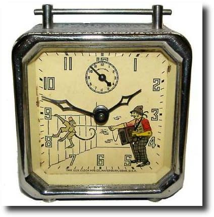 C.1948, Lux Clock Mfg Co., Waterbury, Conn, Organ Grinder and Monkey animated alarm clock, — Antique Clocks Price Guide
