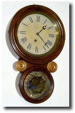 C.1870, E. Ingraham and Co., "IONIC" wall clock — Antique Clocks Price Guide