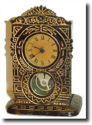 C.1882, Yale Clock Co, New Haven, Conn., miniature cast iron timepiece — Antique Clocks Price Guide
