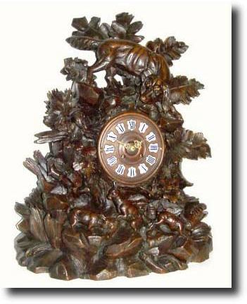 C.1880, Swiss, Black Forest, Carved mantel clock, — Antique Clocks Price Guide