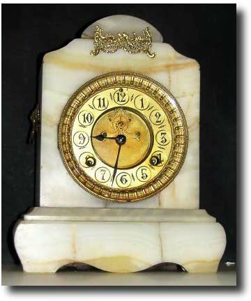 C.1890, Waterbury Clock Co., White Onyx with bronze accents mantel clock. — Antique Clocks Price Guide