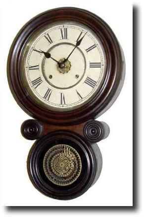 C.1885, Ansonia Clock Co, "KOBE" ionic wall clock, — Antique Clocks Price Guide