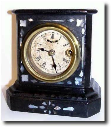 C.1850, American Clock Co, Mini Cast Iron mantel clock, — Antique Clocks Price Guide